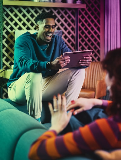 A man playing games on a tablet